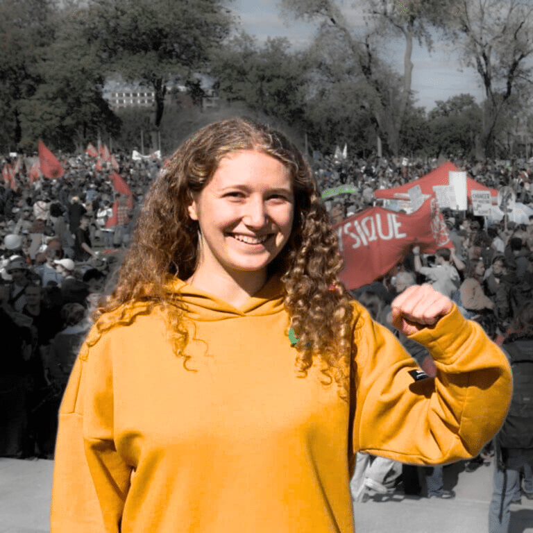 Guilbeault Fridays for Future page, picture of Shirley Barnea in front of a protest