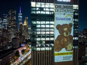 Oil gas emissions cap wall projection action at New York Climate Week